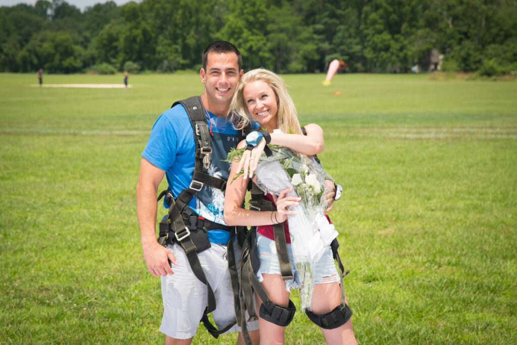 Skydiver showing off her new engagement ring.